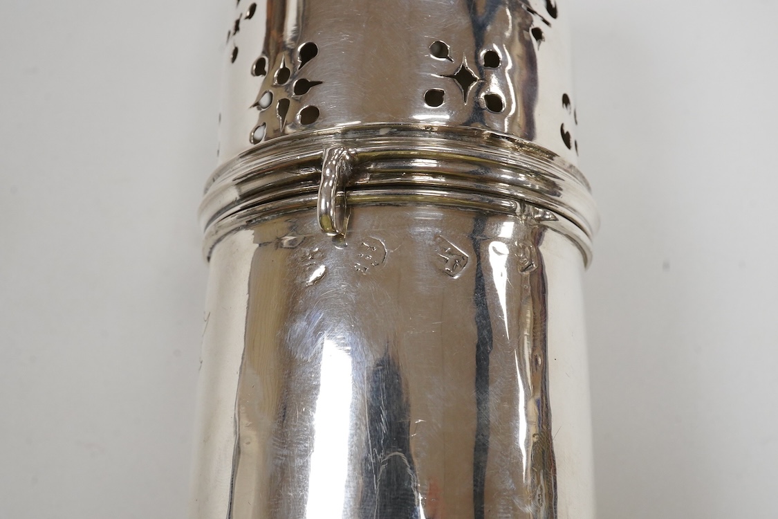 An early 18th century silver lighthouse sugar caster, with later engraved armorial, marks rubbed, London, post 1720, (repaired), height 18.2cm, 10.8oz.